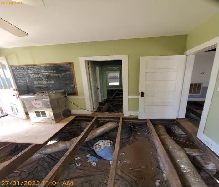 flooring removed in kitchen of home