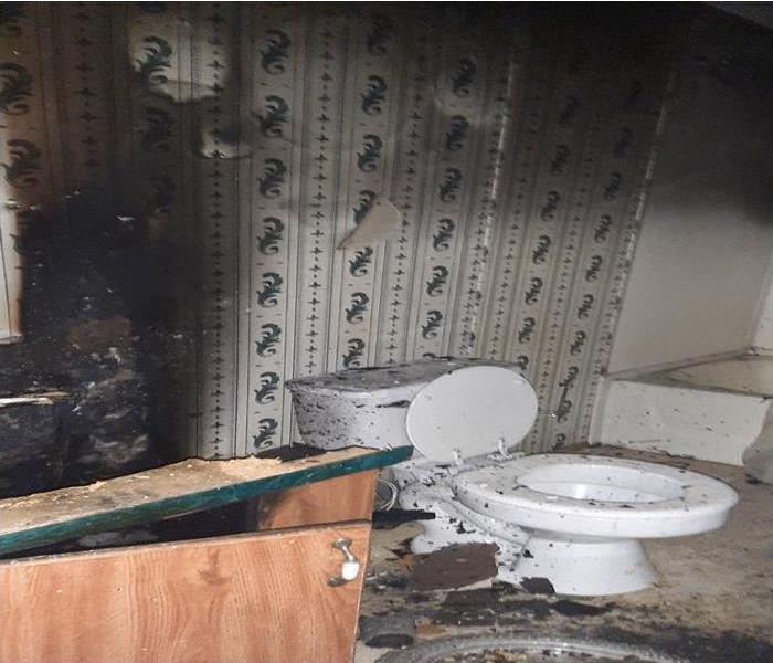 bathroom with fire damage